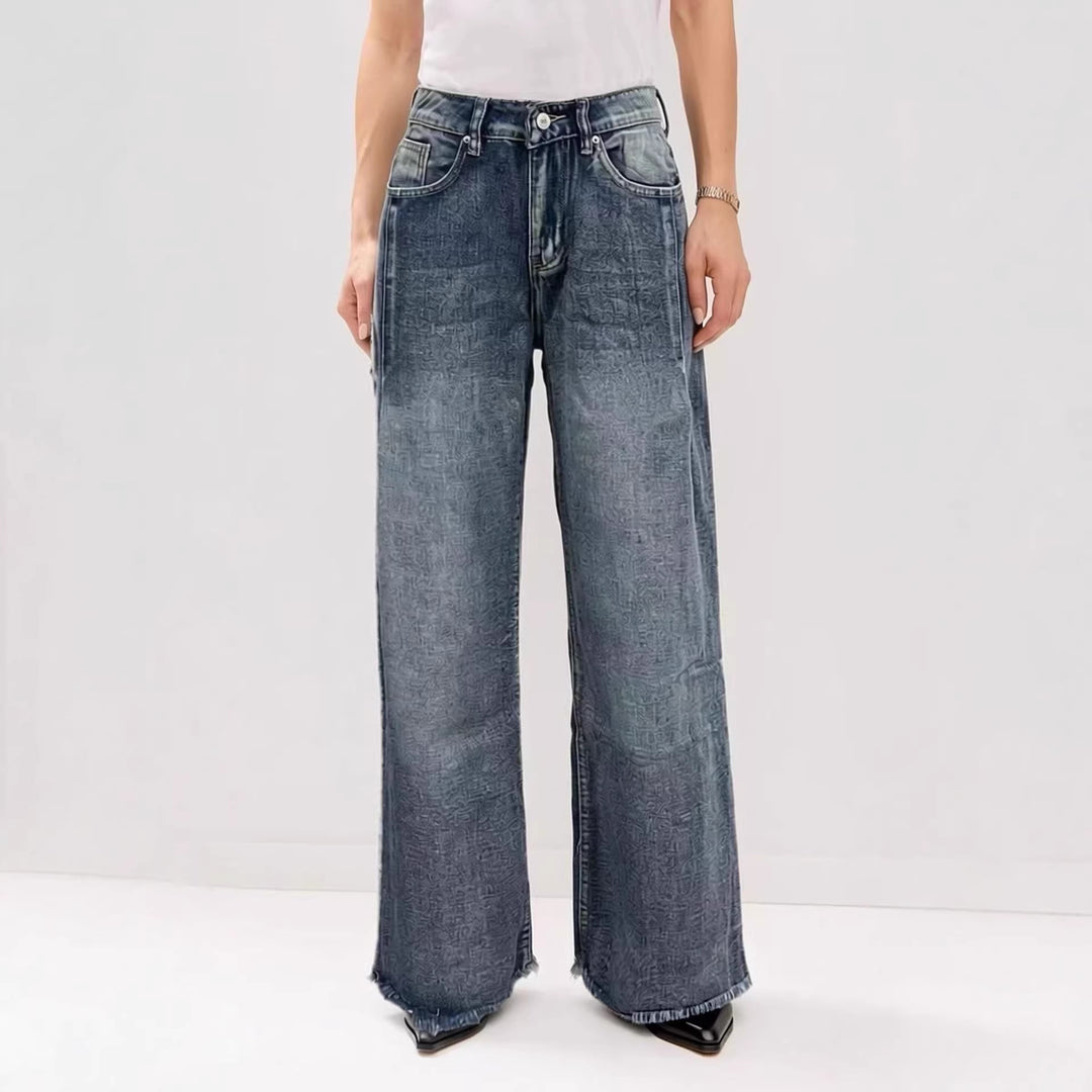 Dame vidde denim-jeans med kreativt mønster og frynset kant Skjora