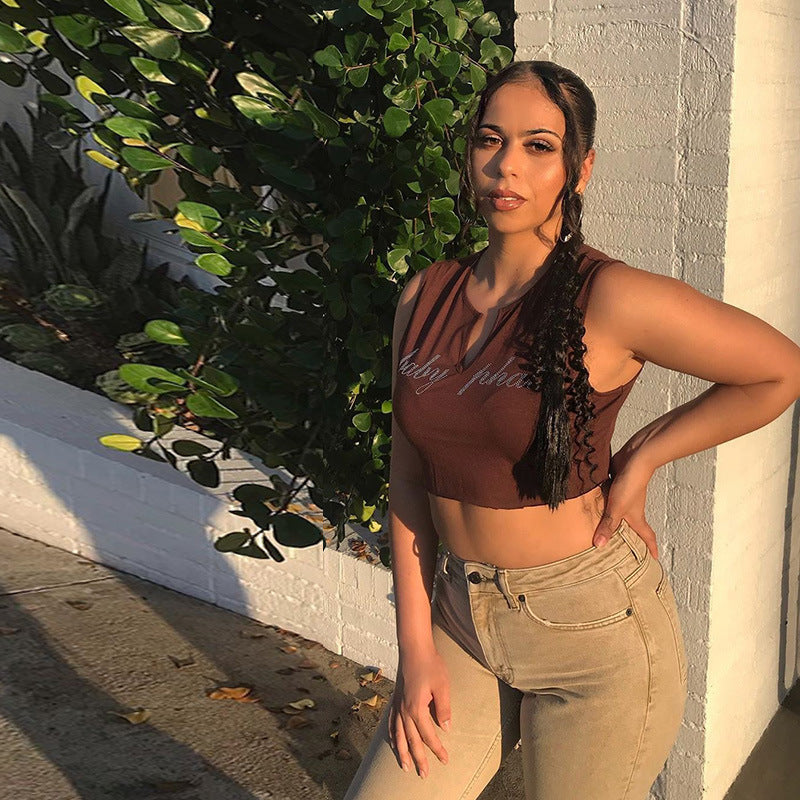 Damer cropped T-skjorte med glitrende tekst Skjora