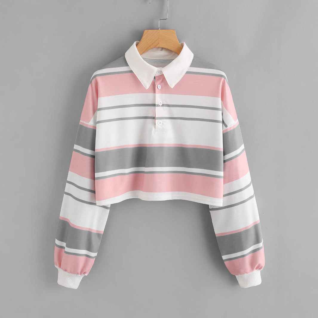 Dame polo skjorte i en avslappet crop design med et stilfullt fargeblokk mønster Skjora