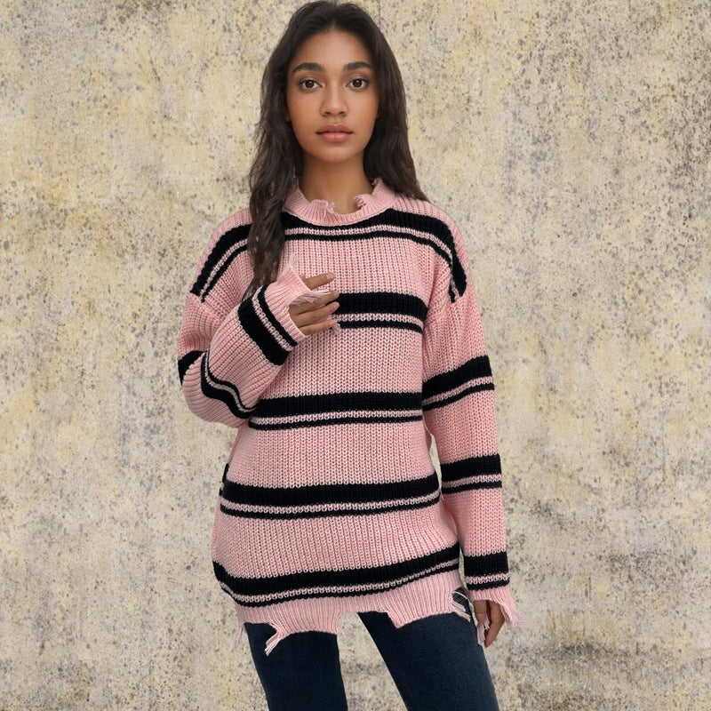 Kvinnens oversized strikket genser med trendy stripe mønster og frynse detaljer Skjora