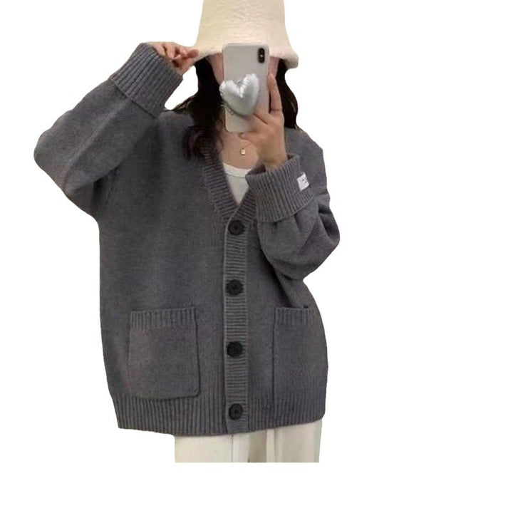 Damenes uformelle oversized cardigan med store lommer og knappdetaljer Skjora