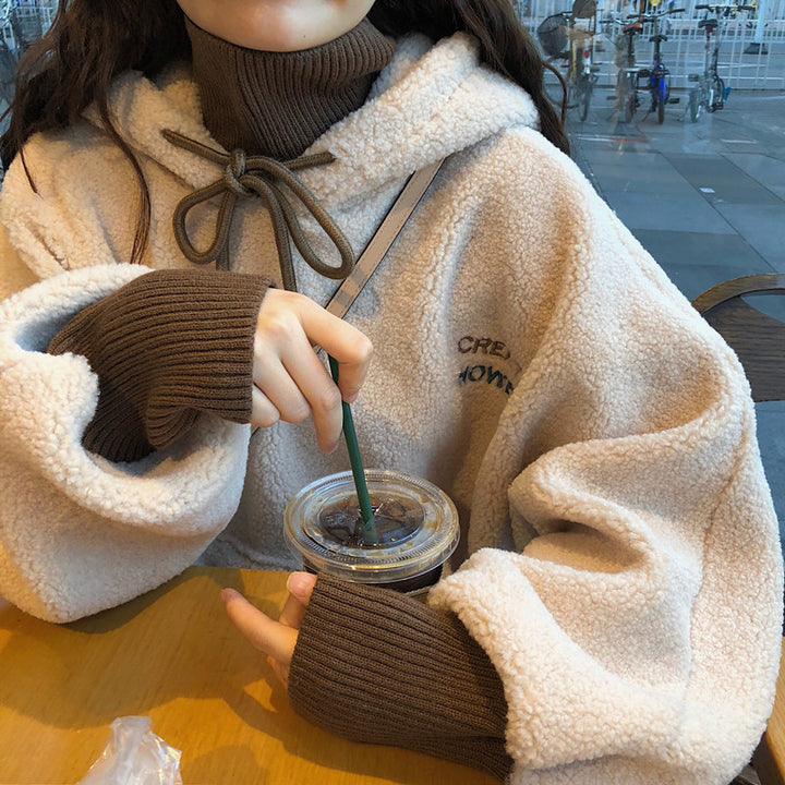 Damer's koselige oversized hettegenser med front kengurulomme og elastiske mansjetter Skjora