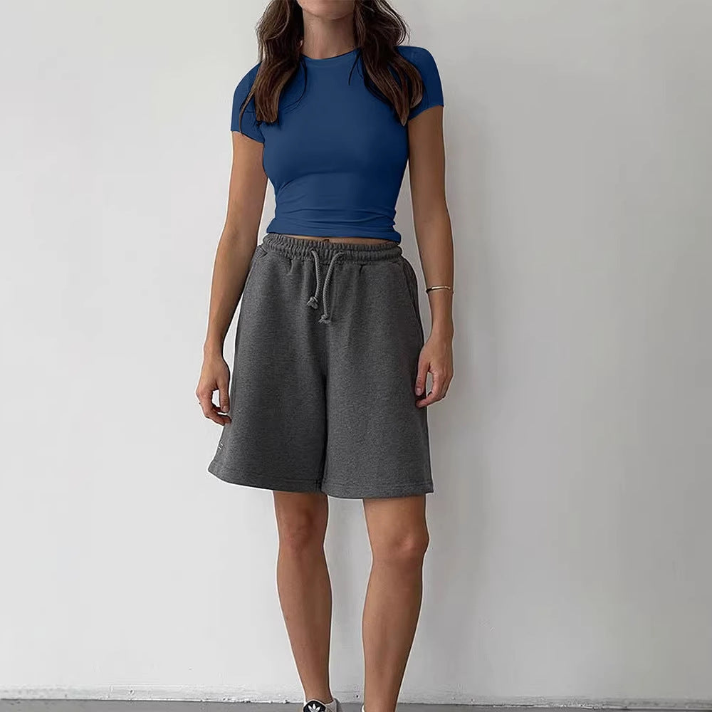 Dame avslappet cropped T-skjorte laget av hudvennlig materiale med rund hals Skjora
