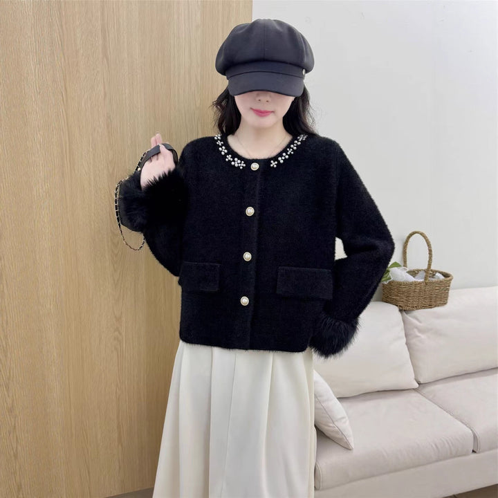 Damer elegant cardigan med perledekorasjon og fluffy ermer Skjora