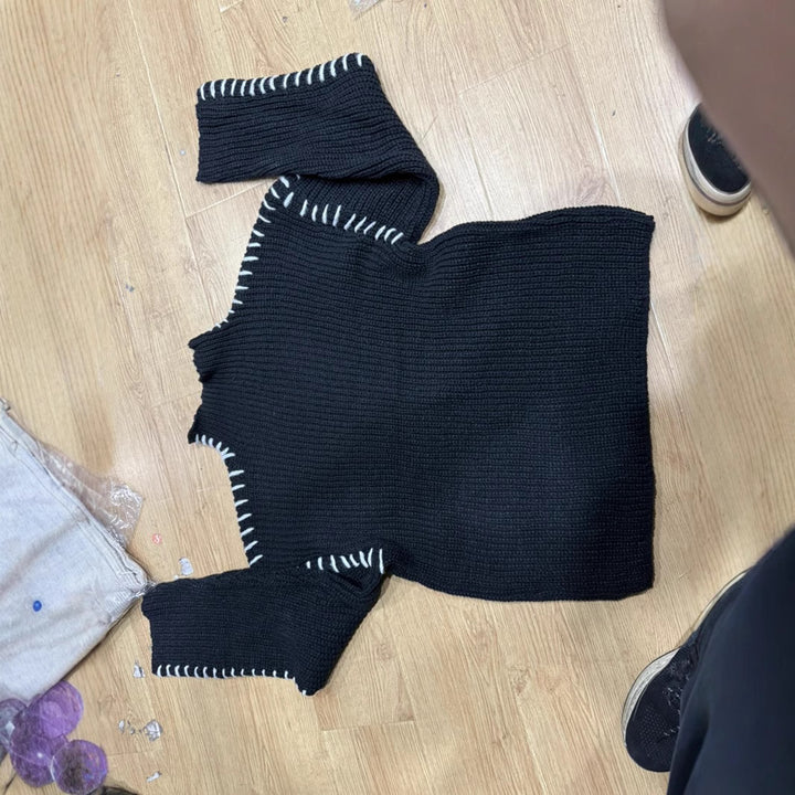 Kvinne chunky strikkegenser med høy krage og elegante erme detaljer Skjora