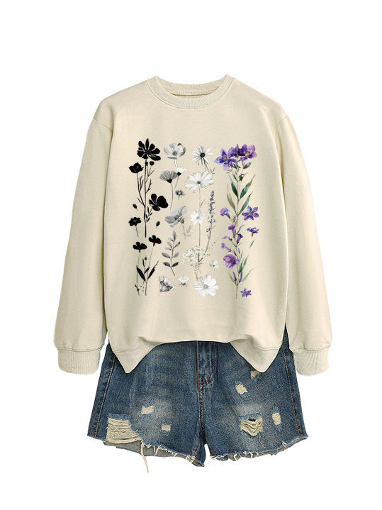 Dame sweatshirt med blomster grafisk design og myk innvendig fôr Skjora