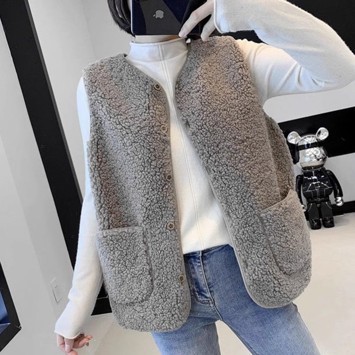 Damer teddy fleece vest med praktiske lommer og knaplukning Skjora