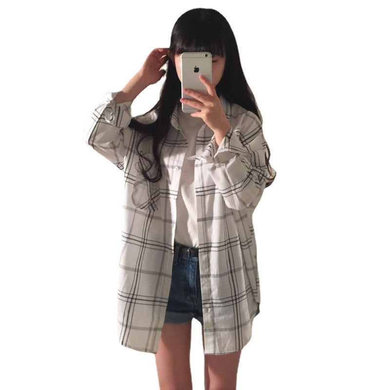 Dame stripete overskjorte bluse i en avslappet fasong med oversized ermer