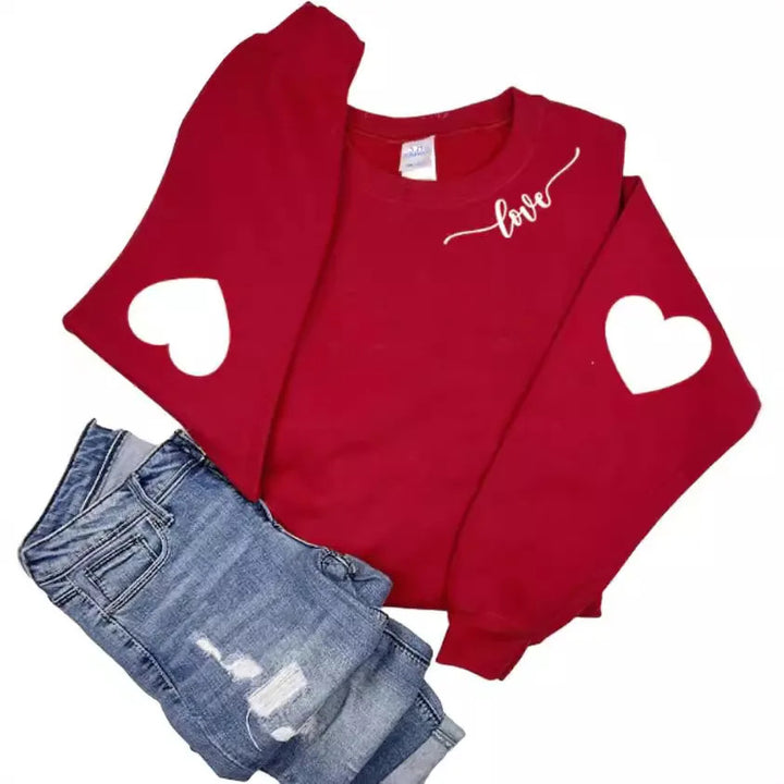 Dame sweatshirt med hjerte design og avslappet passform Skjora