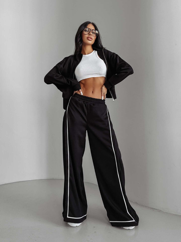 Dame casual tracksuit med løs passform og praktiske lommer