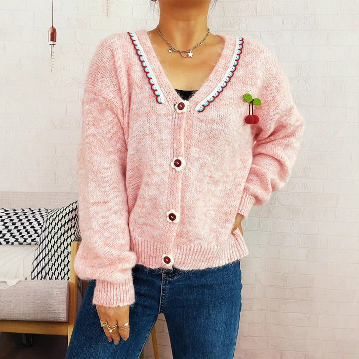 Dame koselig cardigan med lekent blomsterdesign og knappedetaljer Skjora