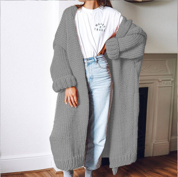 Dame chunky strikket cardigan med komfortabel oversized passform og dype lommer Skjora