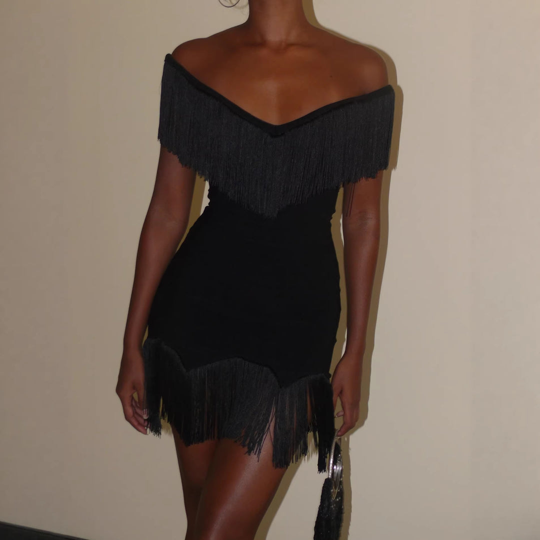 Dame Top med frynsete detalj og off-shoulder-design Skjora