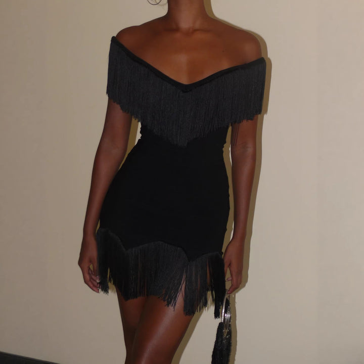 Dame Top med frynsete detalj og off-shoulder-design Skjora