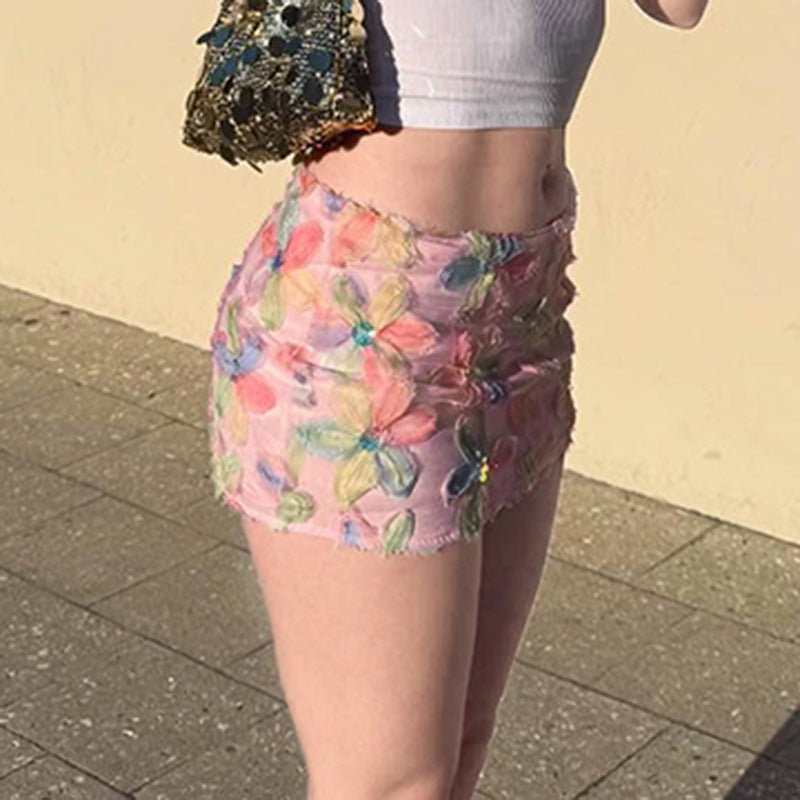 Dame miniskjørt med blomster 3D-design og glitrende aksenter Skjora