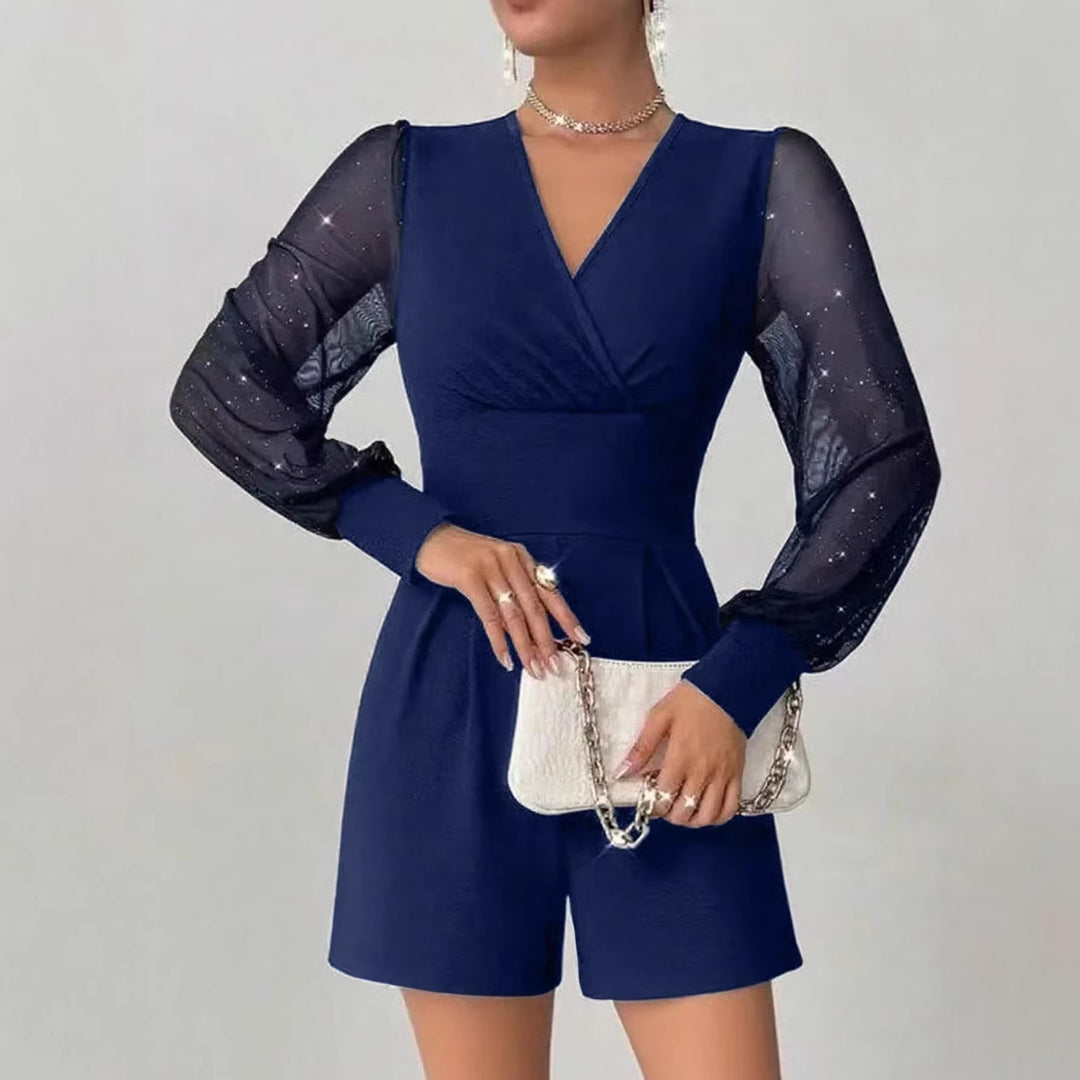 Dame elegant jumpsuit med transparente puffermer og V-hals Skjora