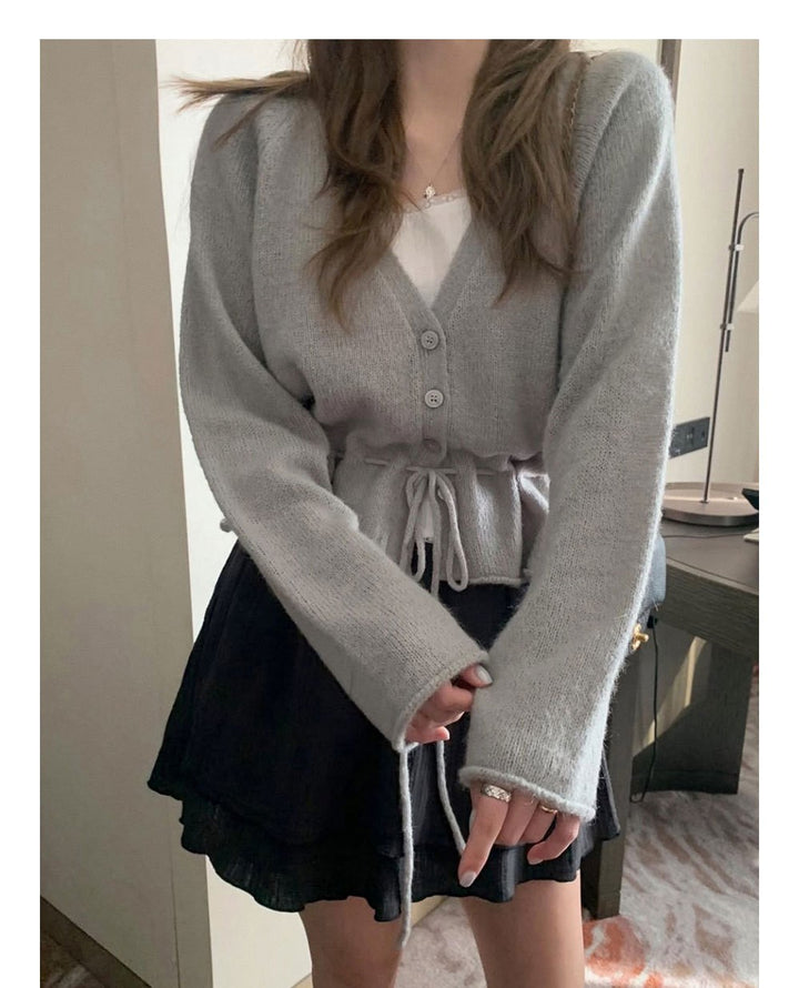 Kvinne cardigan med tilpasset design og knytbar belte Skjora