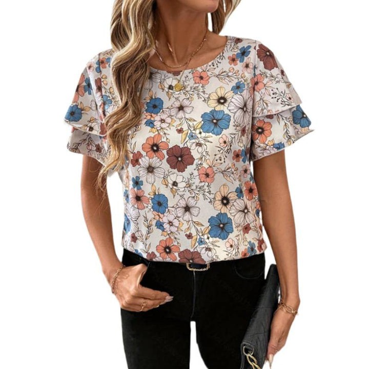 Damer kortermet bluse med volang og blomsterdesign Skjora
