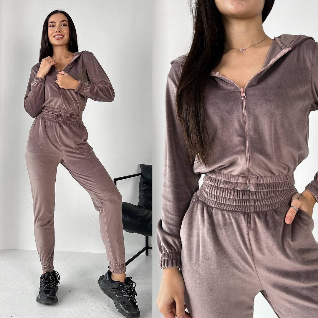 Kvinner's Velour Joggedrakt med Fasjonabel Kuttet Design og Praktisk Glidelås Skjora