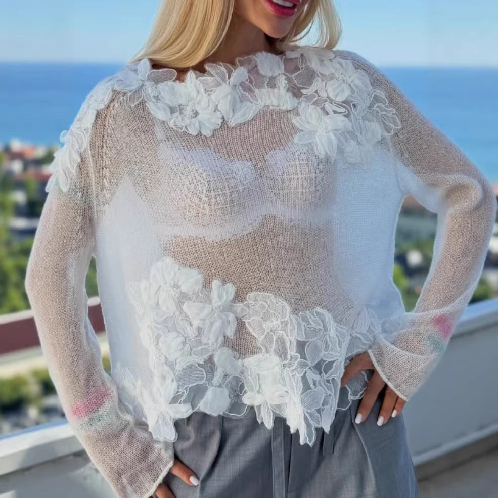 Kvinne strikkegenser med blomsterlakk aksenter og gjennomsiktig design Skjora