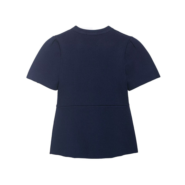 Damebluse med strukturerte puffarmer og knappedetalj Skjora
