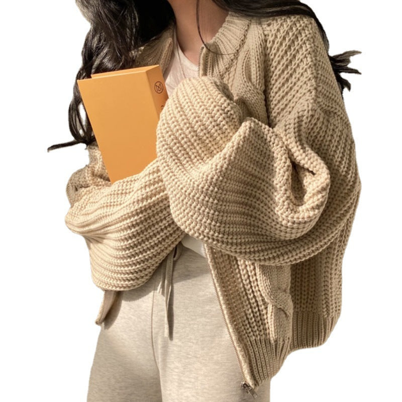 Kvinnens koselige cardigan med voluminøse ermer og moderne design Skjora
