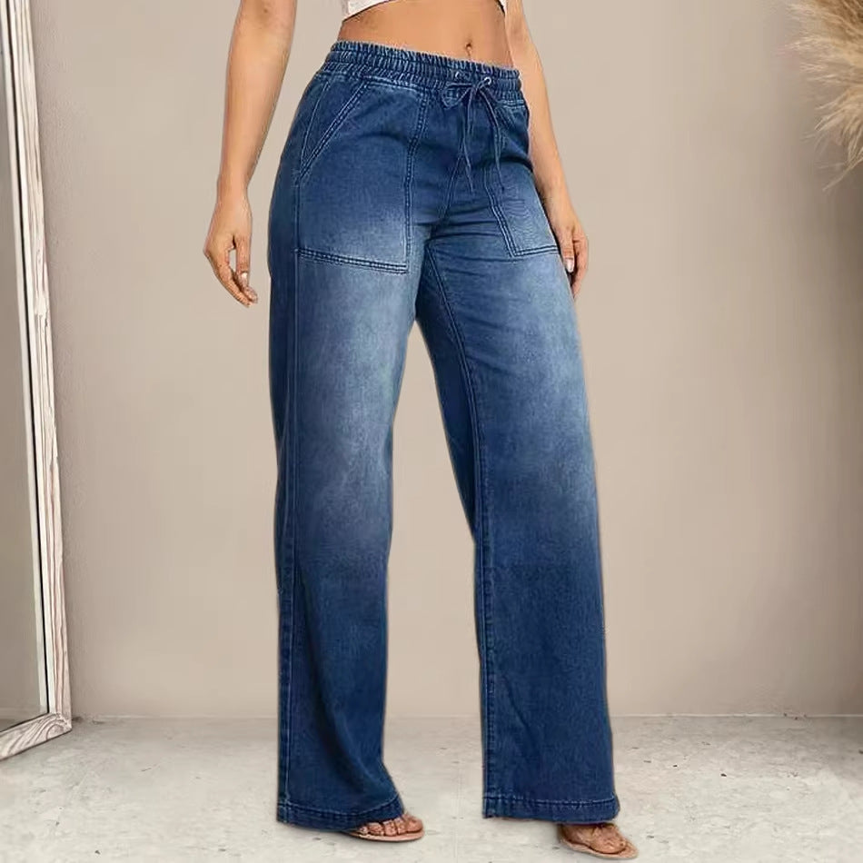 Kvinners vidde jeans med elastisk midje og trendy brukt utseende