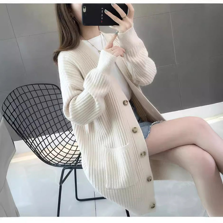 Dame cardigan med lappelommer og knappestolpe Skjora