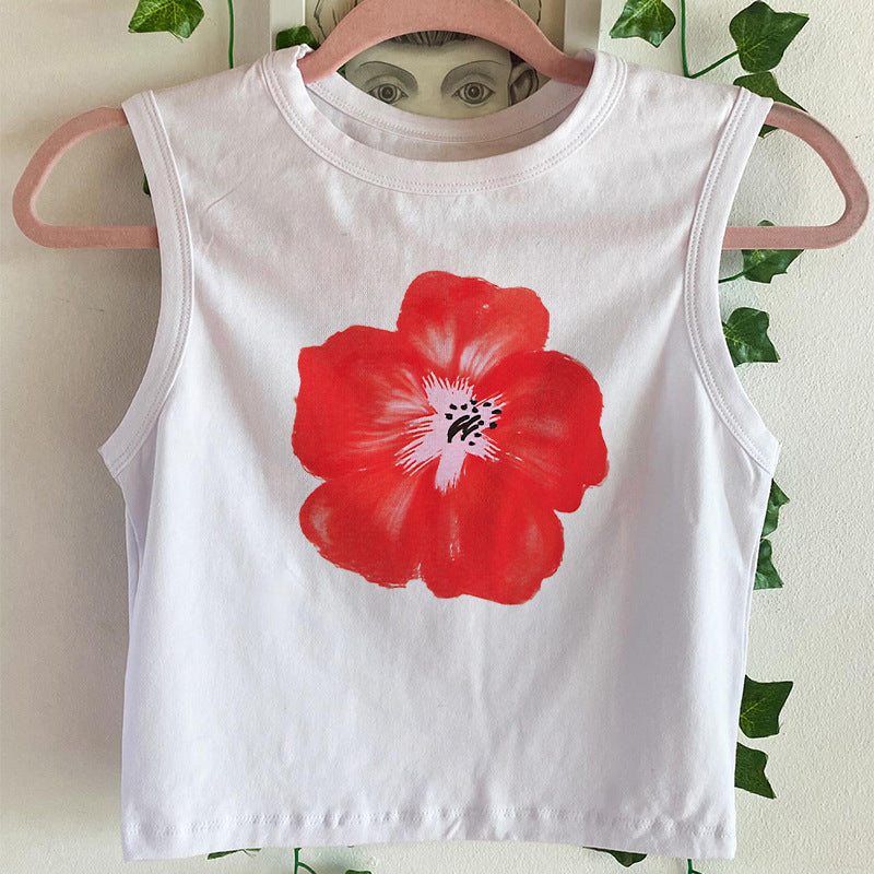 Damer ermeløs topp med blomsterlig hibiskus-motiv Skjora