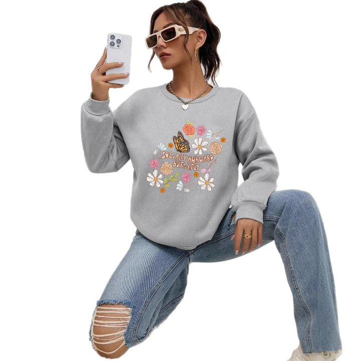 Kvinne sweatshirt med kreativt blomsterdesign og inspirerende trykk Skjora