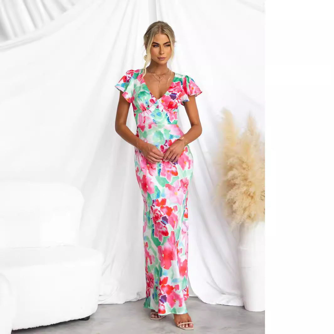 Kvinnes maxi kjole med blomsterdesign og flytende silhuett Skjora