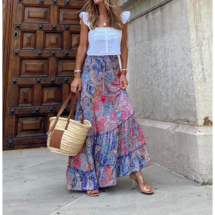 Women's maxi dress with cheerful pattern Skjora