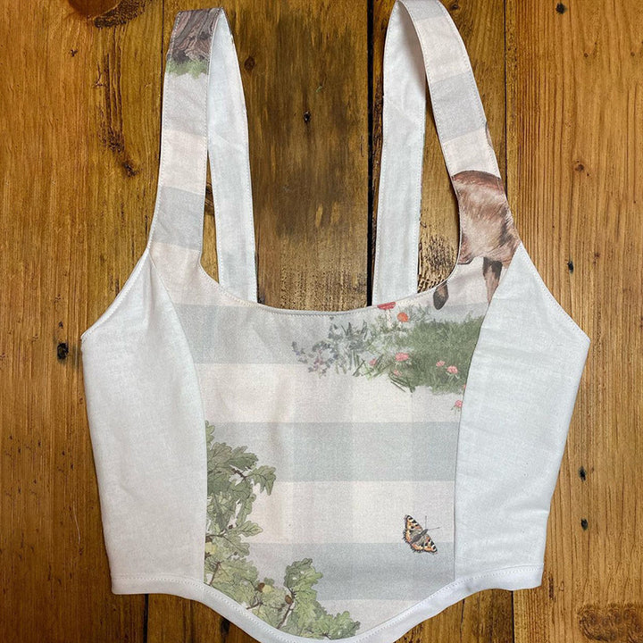 Damer Crop Top med kunstnerisk flora-design og justerbare stropper Skjora