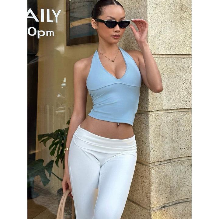 Dame sporty cropped top med V-hals og figurformende snitt Skjora