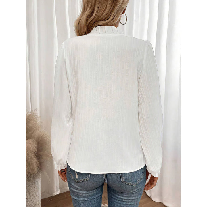 Elegant bluse for kvinner med volanger og folder