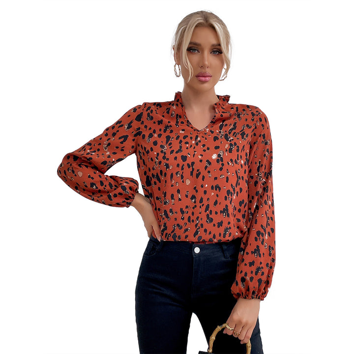 Damebluse med blomster leopardmønster og voluminøse ermer Skjora