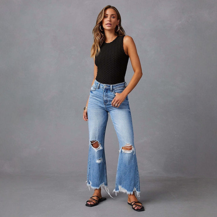 Dame Flared Jeans med stilige rift detaljer og frynsete hem Skjora