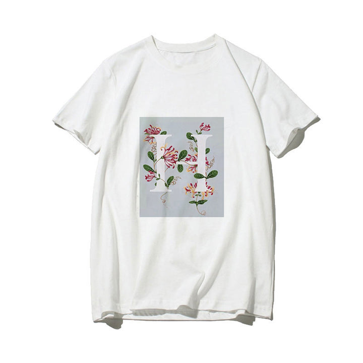 Dame T-skjorte med blomsterdesign og kreativt trykk Skjora