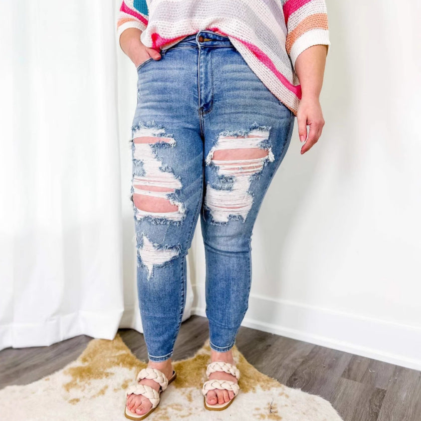 Kvinne skinny jeans med trendy ødelagt utseende og elastisk midjebånd Skjora