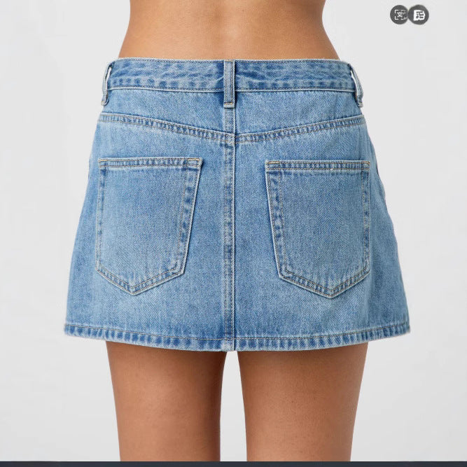 Dame Denim-miniskjørt med fashionable lommer og klassisk snitt Skjora