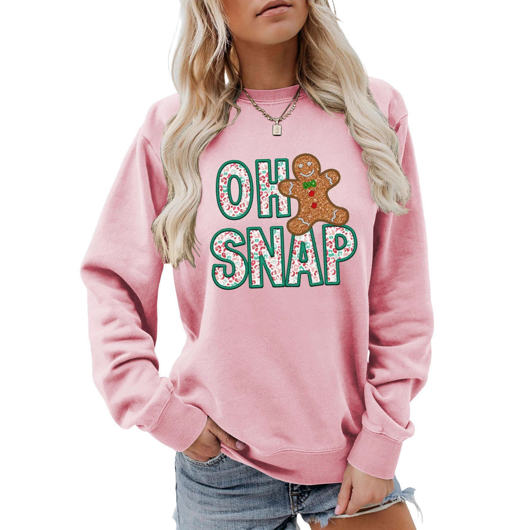 Dame sweatshirt med morsomt pepperkakemannmotiv og glitrende bokstaver Skjora