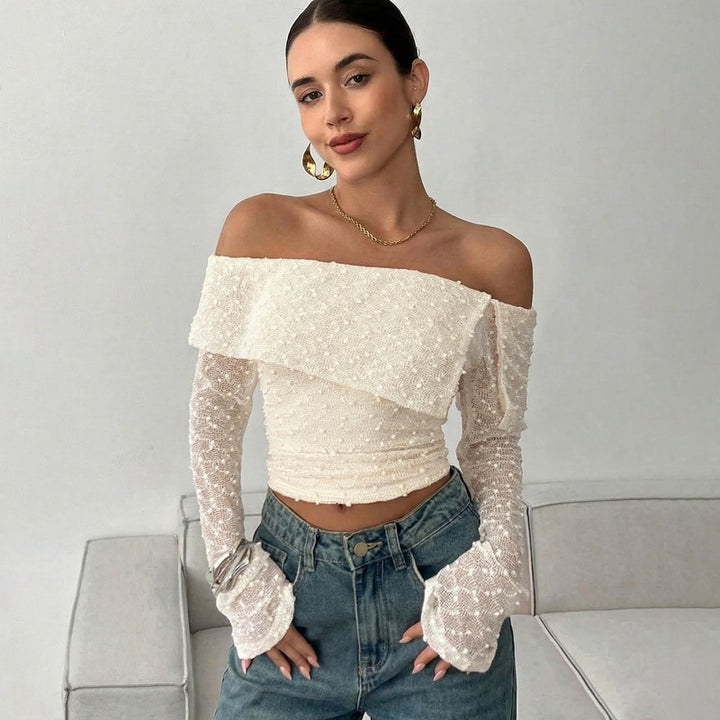 Dame Off-Shoulder topp med elegante volangdetaljer og lange ermer Skjora
