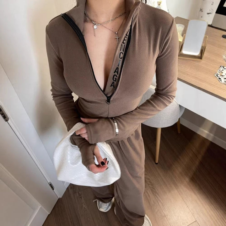 Dame joggedress med moteriktig glidelås og lange ermer Skjora