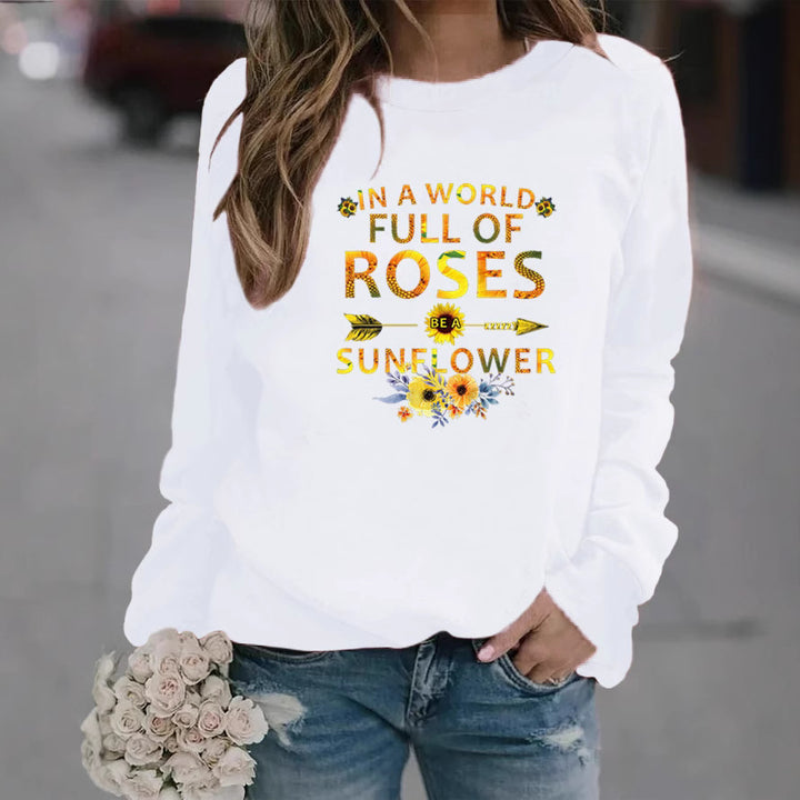 Dame sweatshirt med inspirerende design og blomsterdekorasjon Skjora