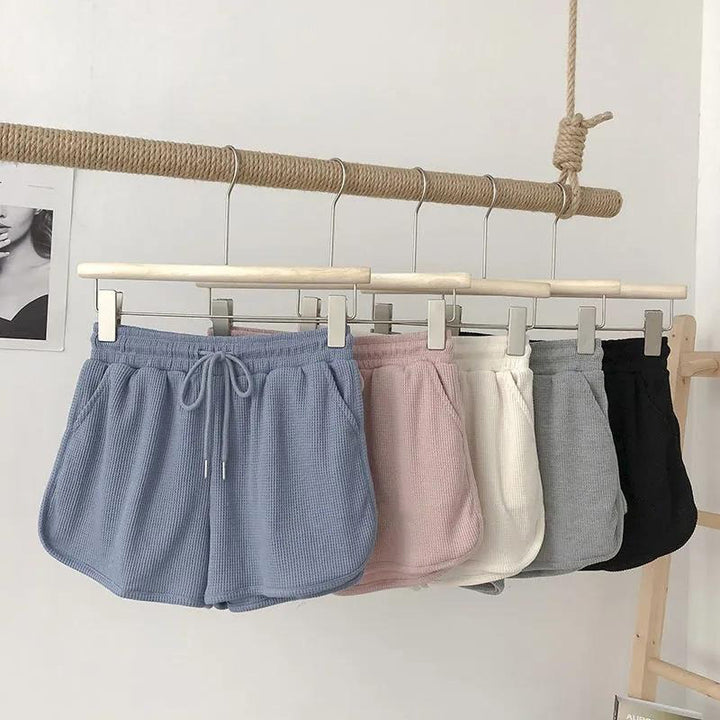Kvinnelige casual shorts med vaffelstruktur og justerbar snorlås og elastisk midjebånd