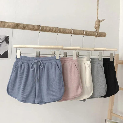 Kvinnelige casual shorts med vaffelstruktur og justerbar snorlås og elastisk midjebånd