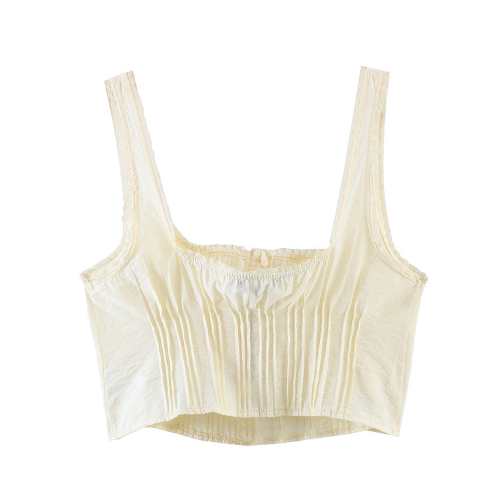 Dame-Crop-Top med fine folder og pynteknapper Skjora