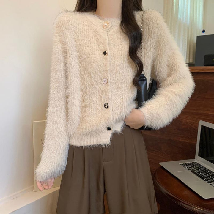 Kvinnelig koselig cardigan med knappe-design og elegant preg Skjora