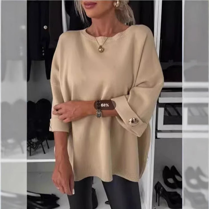 Kvinne Elegant Strikkegenser med Bred Kutt Ermer og Knappe Detaljer Skjora