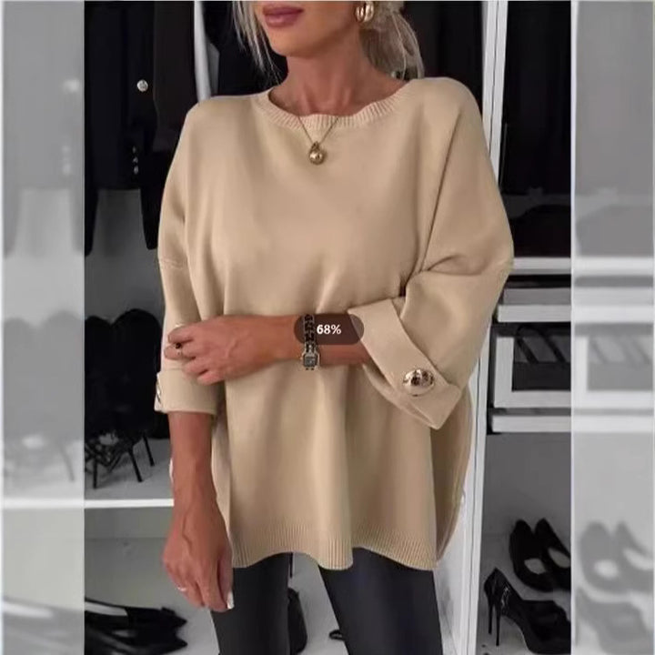 Kvinne Elegant Strikkegenser med Bred Kutt Ermer og Knappe Detaljer Skjora